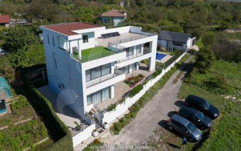 Large modern home with panoramic sea views, pool, and rooftop terrace